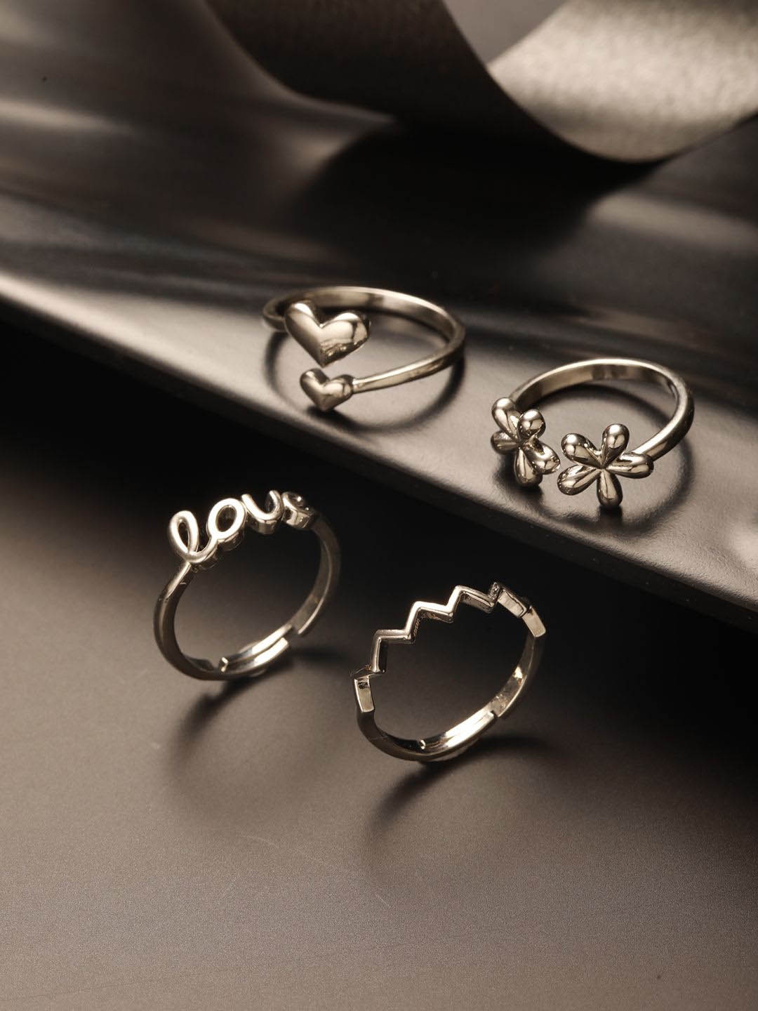 

Jazz and Sizzle Silver-Plated Set Of 4 Stainless Steel Adjustable Finger Rings