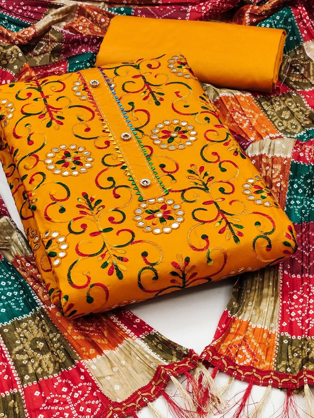 

Rangtulika Floral Embroidered Mirror Work Unstitched Dress Material, Yellow