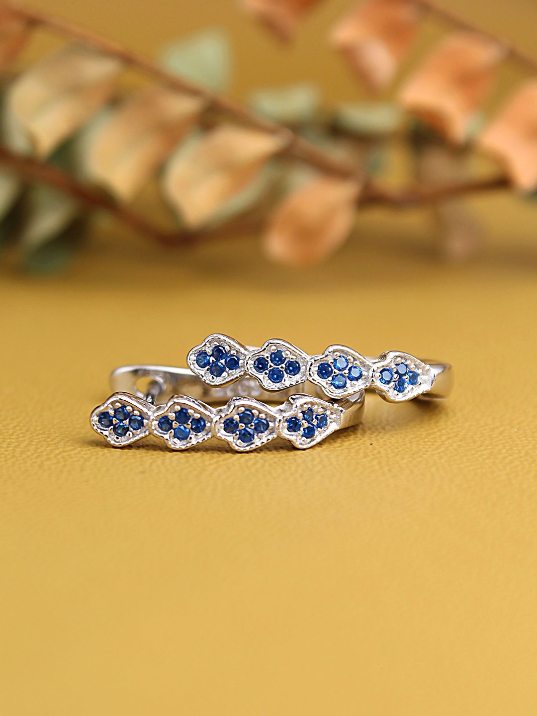 

DEVASHREE 925 Sterling Silver Rhodium-Plated Cubic Zirconia Studded Leaf Shaped Studs, Blue