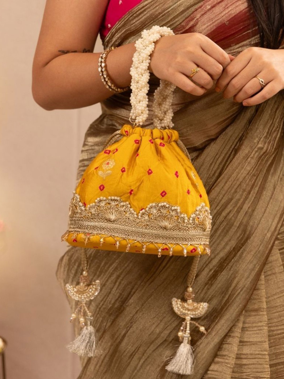 

AMYRA Structured Handheld Bag with Tasselled, Mustard