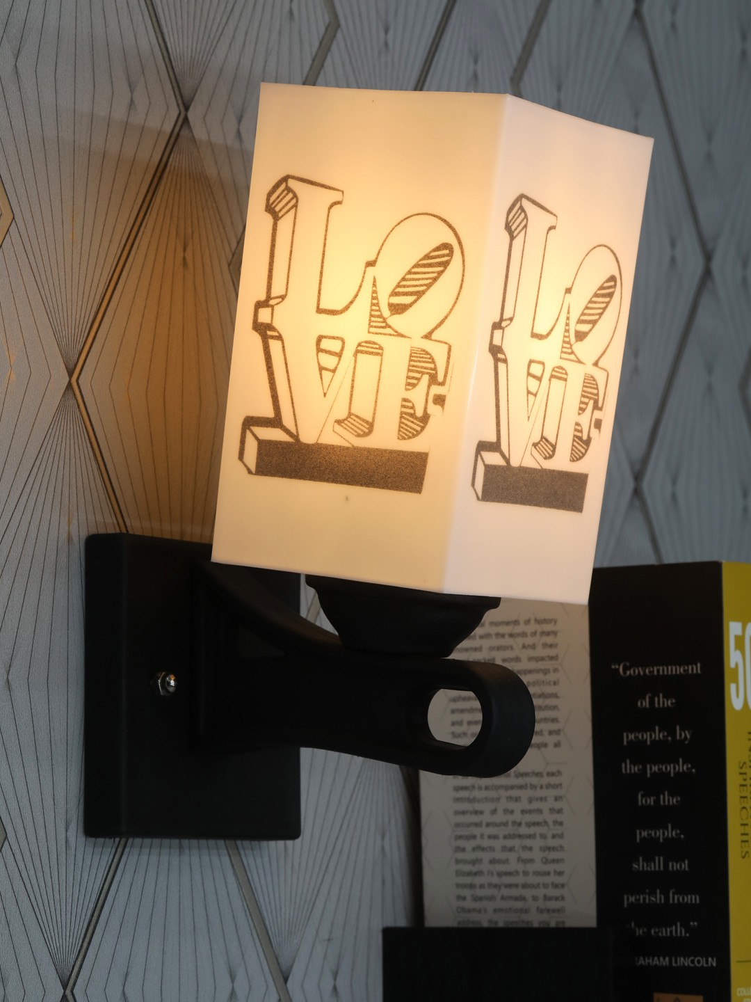 

Gojeeva White & Black Printed Acrylic Traditional Rectangle Shaped Wall Lamp