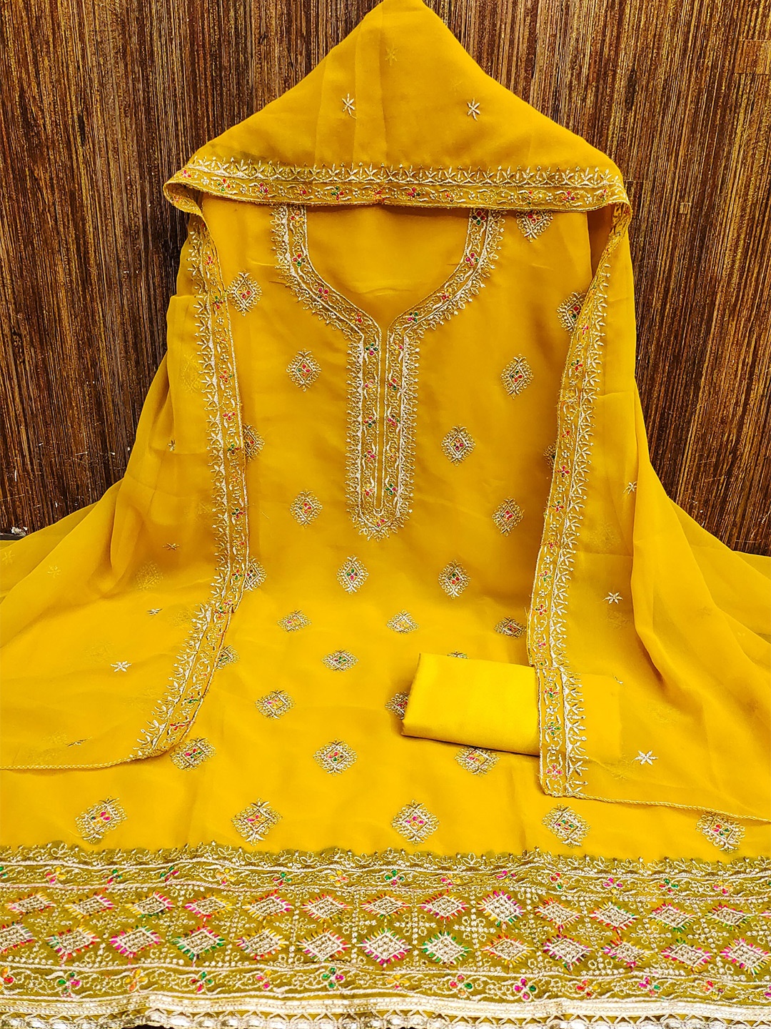 

Rangtulika Floral Embroidered Unstitched Dress Material, Yellow