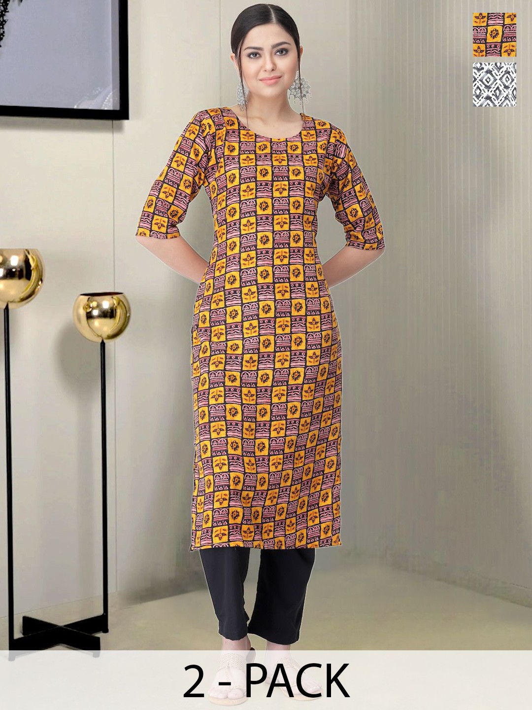 

Moda Rapido Selection Of 2 Ethnic Motifs Printed Round Neck Straight Kurtas With Trousers, Orange