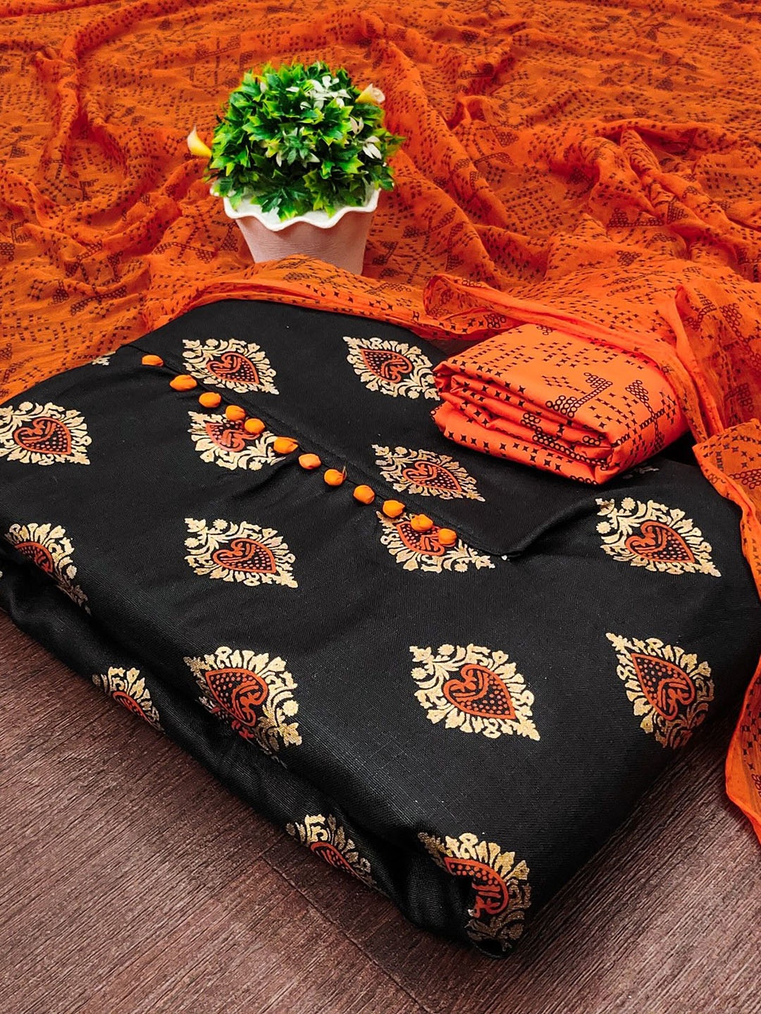 

Rangtulika Ethnics Motifs Printed Unstitched Dress Material, Orange