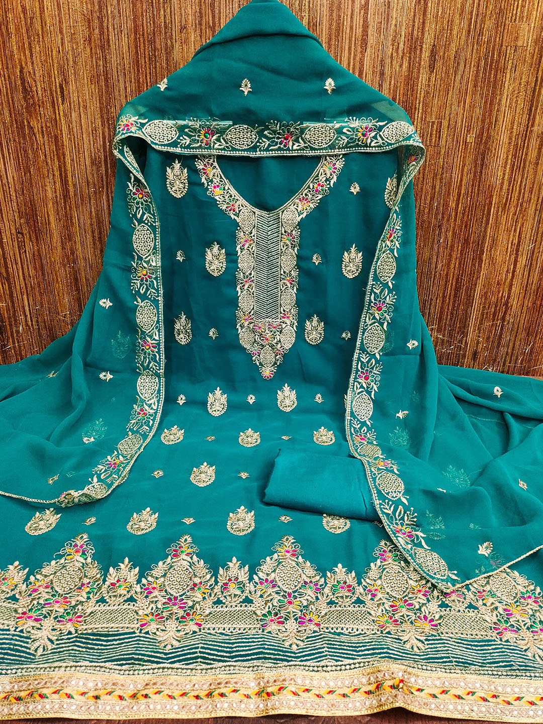 

Rangtulika Floral Embroidered Georgette Unstitched Dress Material, Blue