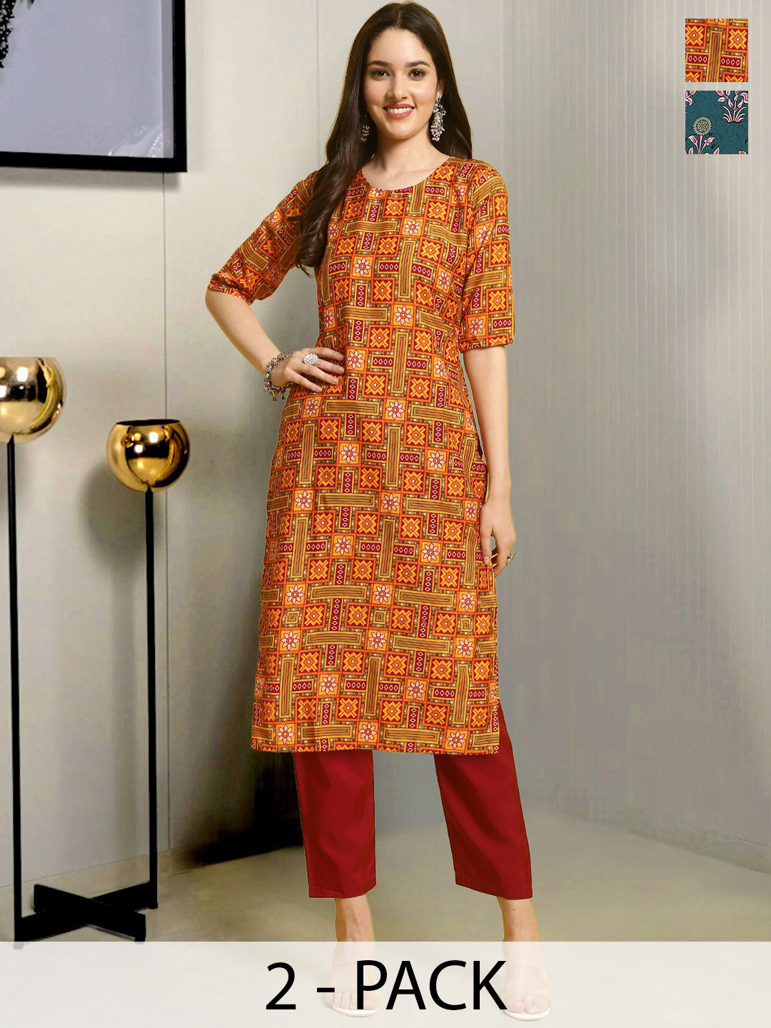 

Moda Rapido Selection of 2 Ethnic Motifs Printed Straight Kurtas With Trousers, Orange