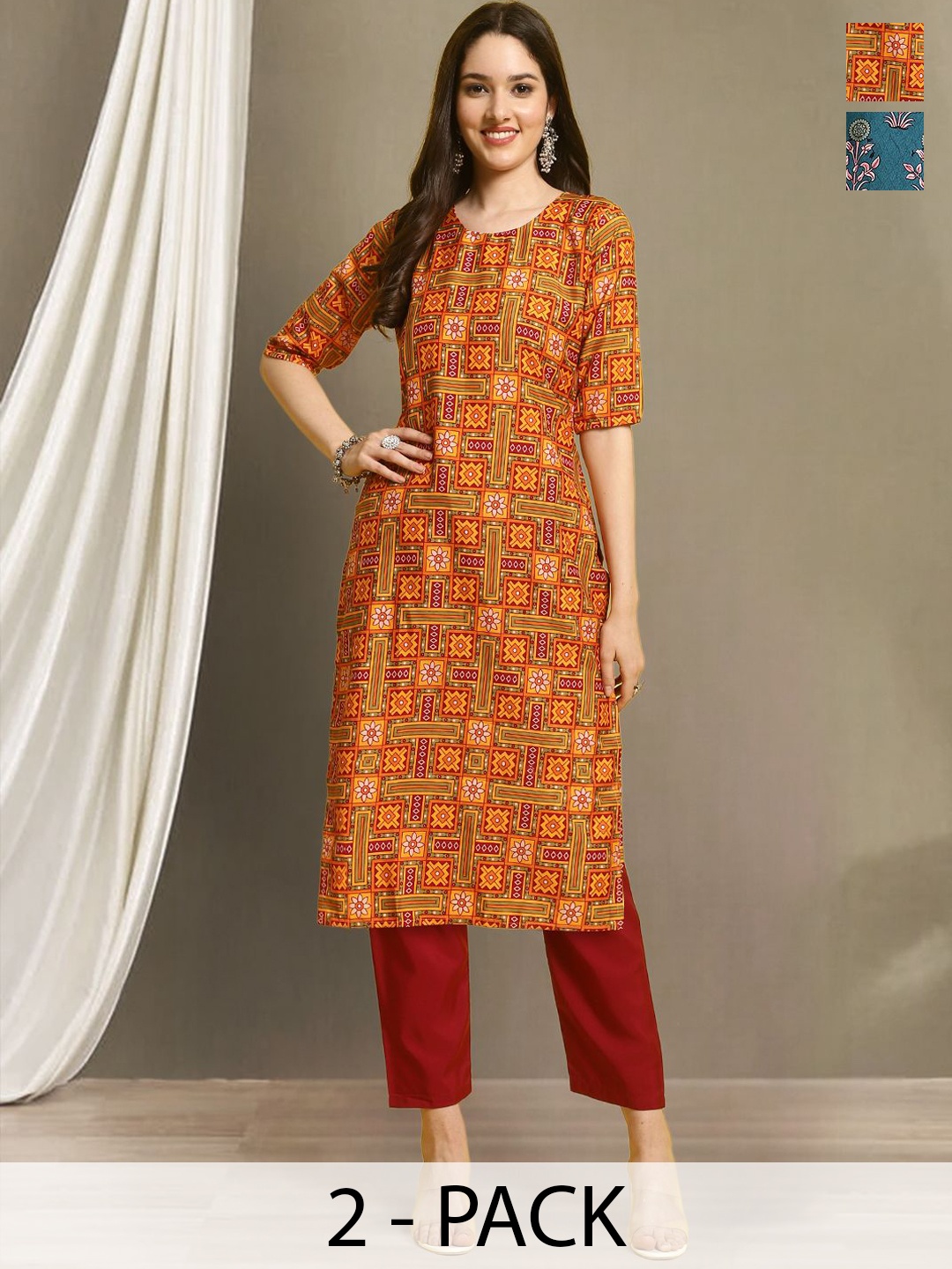 

Moda Rapido Selection Of 2 Ethnic Motifs Printed Round Neck Straight Kurtas with Trousers, Orange