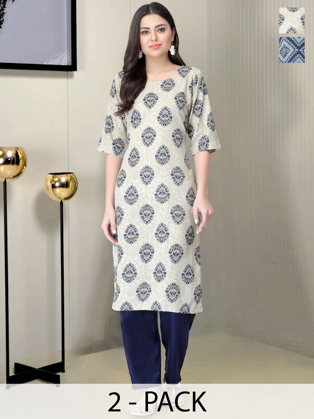 

Moda Rapido Selection Of 2 Ethnic Motifs Printed Round Neck Straight Kurtas With Trousers, White