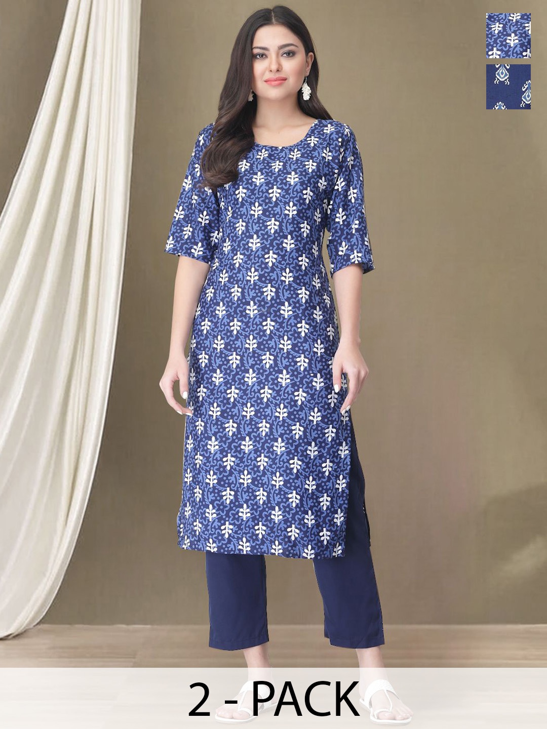 

Moda Rapido Selection Of 2 Ethnic Motifs Printed Round Neck Straight Kurtas With Trousers, Blue
