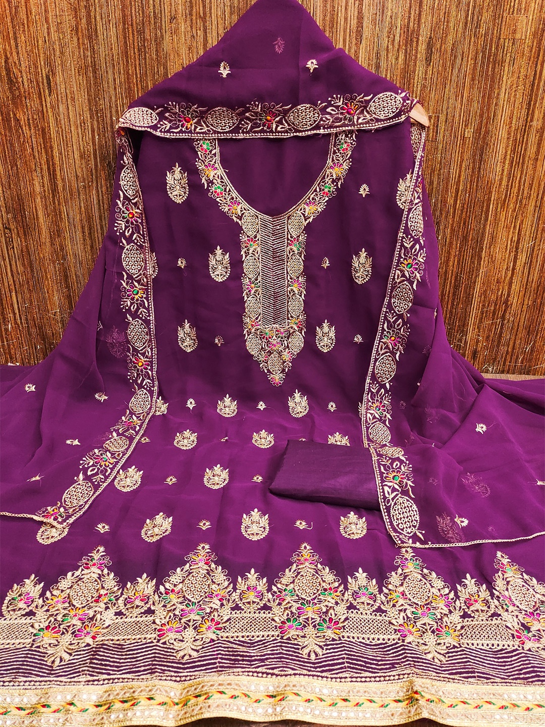 

Rangtulika Floral Embroidered Zari Unstitched Dress Material, Purple