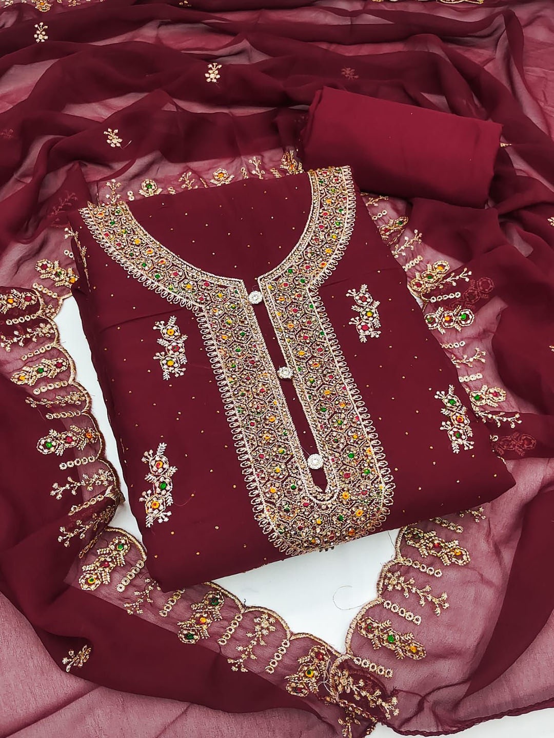 

Rangtulika Ethnics Motifs Embroidered Thread Work Unstitched Dress Material, Maroon