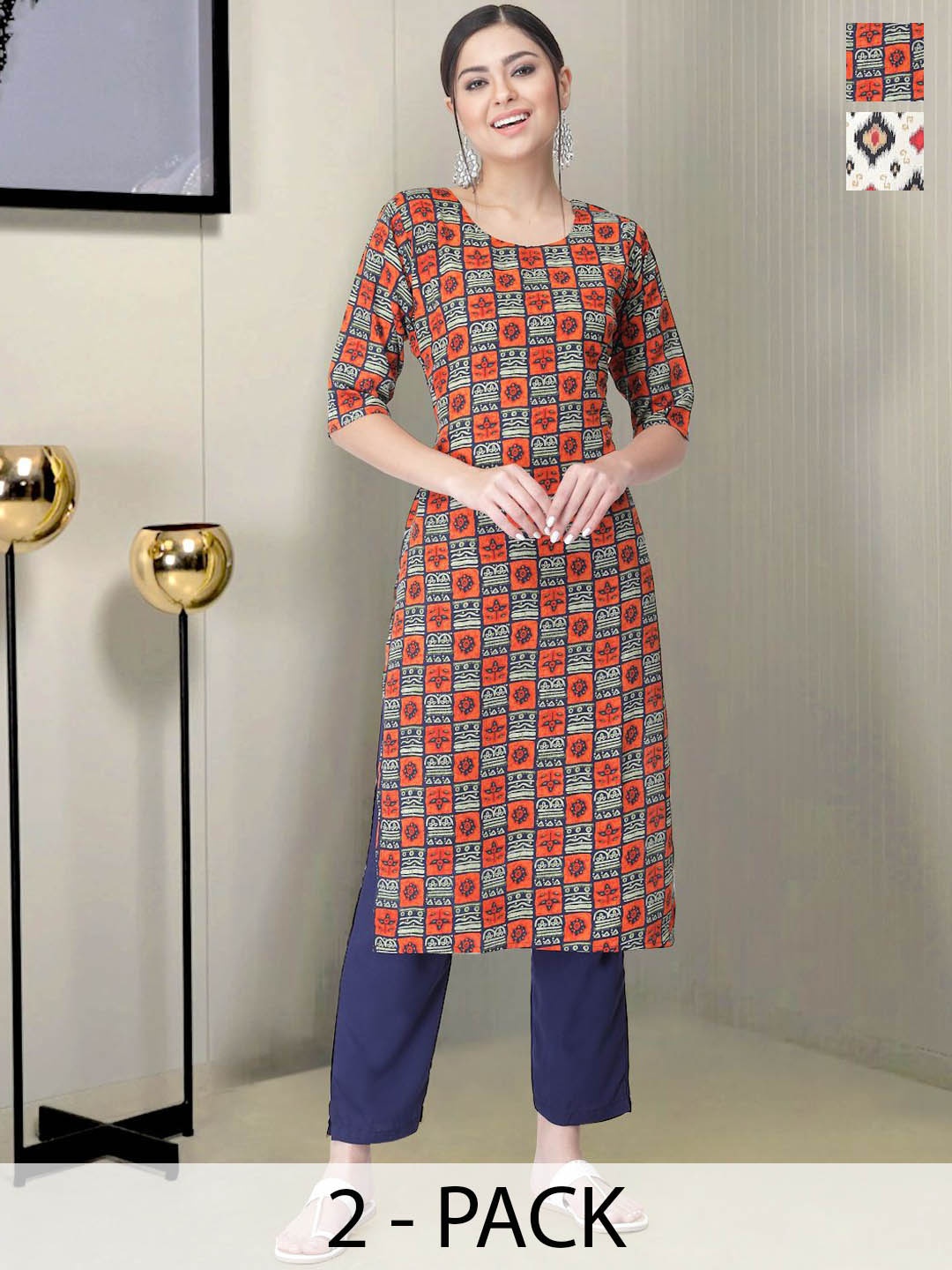 

Moda Rapido Selection of 2 Ethnic Motifs Printed Straight Kurtas With Trousers, Orange