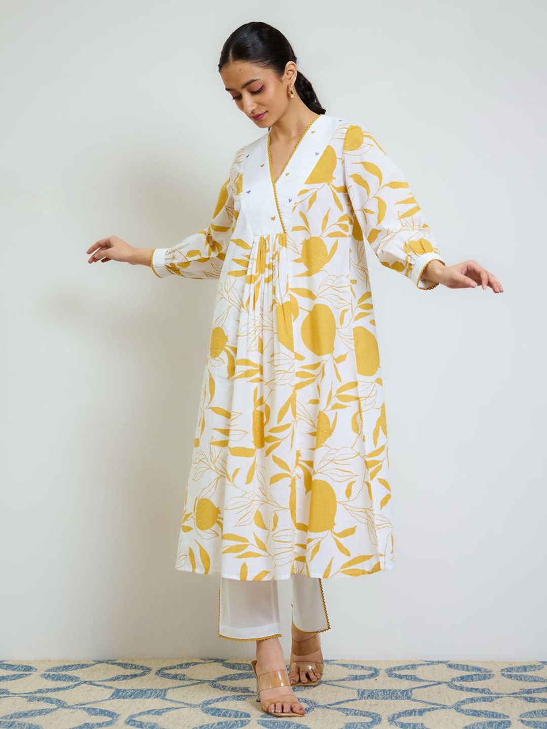 

Rustorange Women Floral Pleated Pure Cotton Kurta with Trousers, Yellow