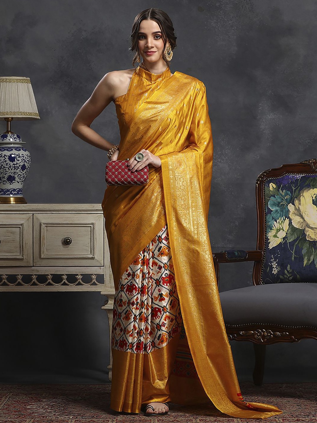 

Anouk Rustic Ethnic Motifs Zari Silk Blend Ikat Saree, Yellow