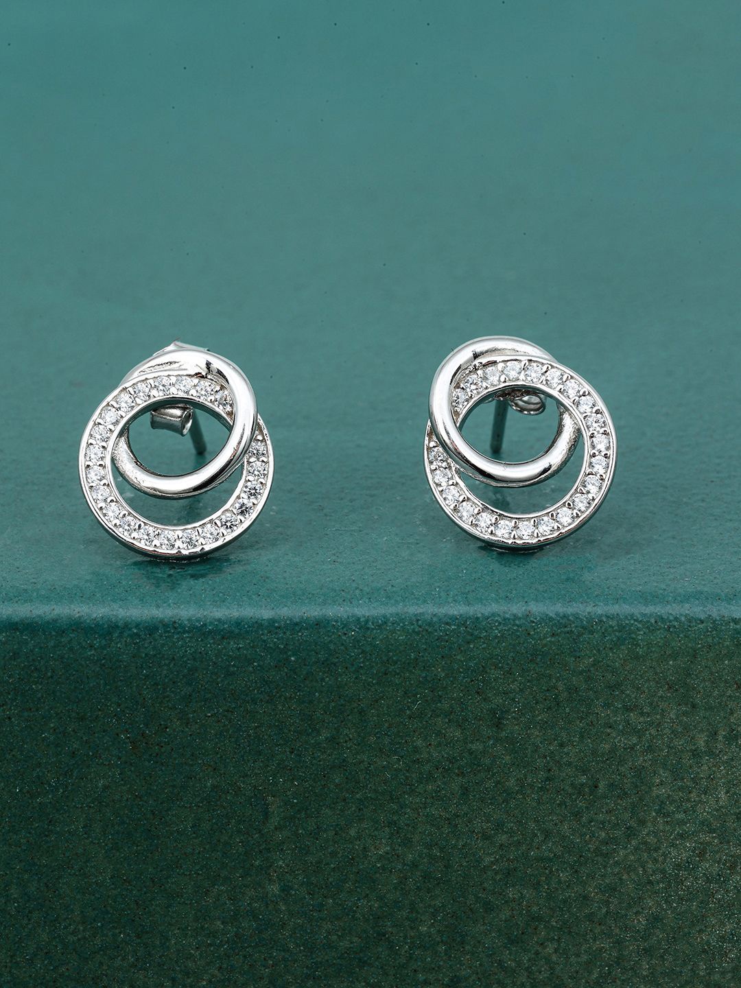 

MAIRA 925 Sterling Silver Rhodium-Plated Cubic Zirconia Studded Circular Shaped Studs