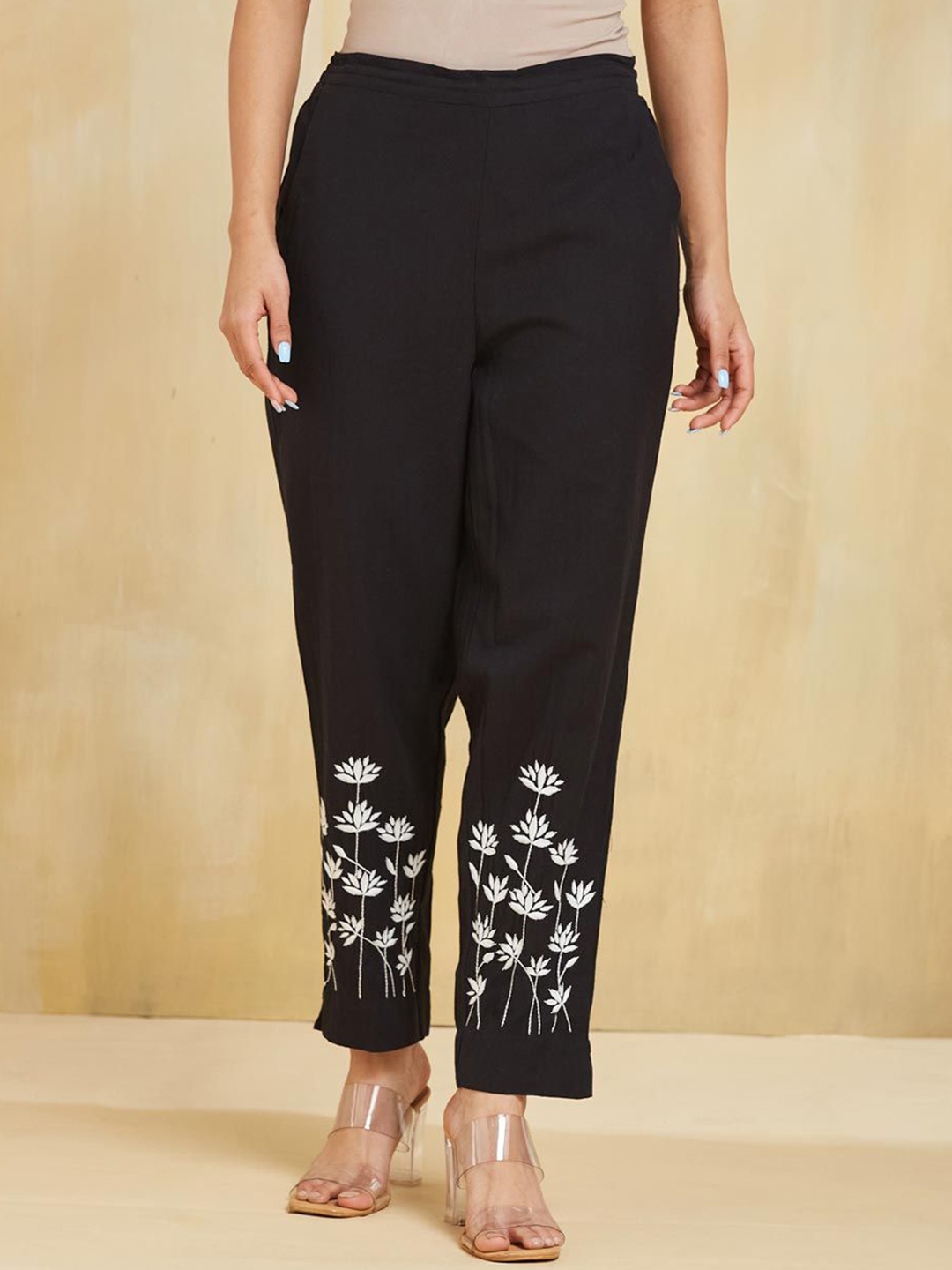 

Fabindia Women Ethnic Motifs Embroidered Slim Fit Trousers, Black