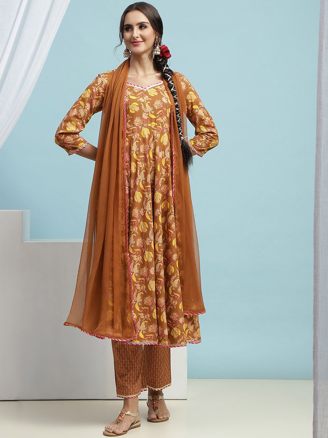 

Khushal K Women Floral Printed Regular Kurta with Palazzos & With Dupatta, Mustard