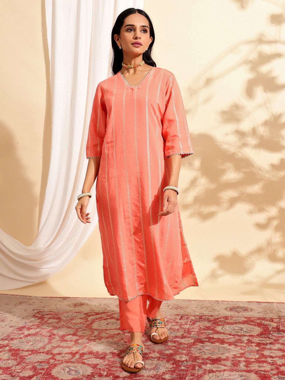 

DIVASTRI Striped V Neck Kurta With Trousers, Orange