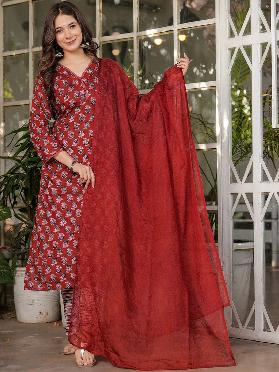 

Meena Bazaar Floral Printed Mirror Work Straight Kurta With Trouser And Dupatta, Rust