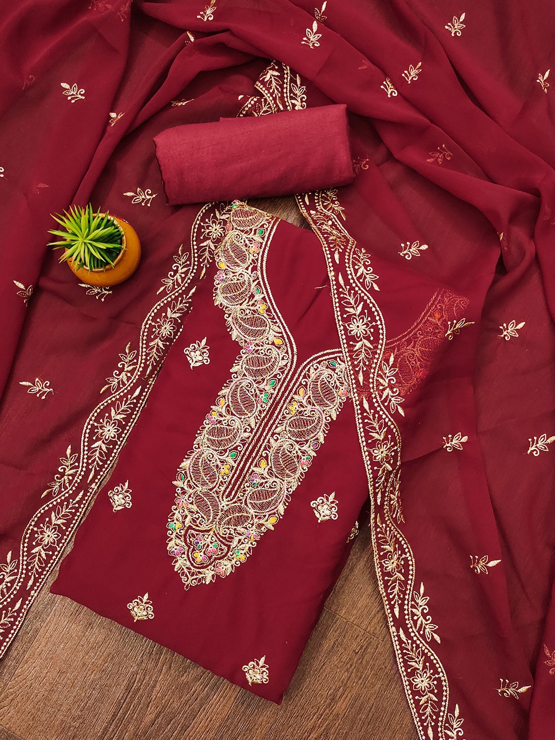 

Rangtulika Floral Embroidered Zari Work Georgette Unstitched Dress Material, Red