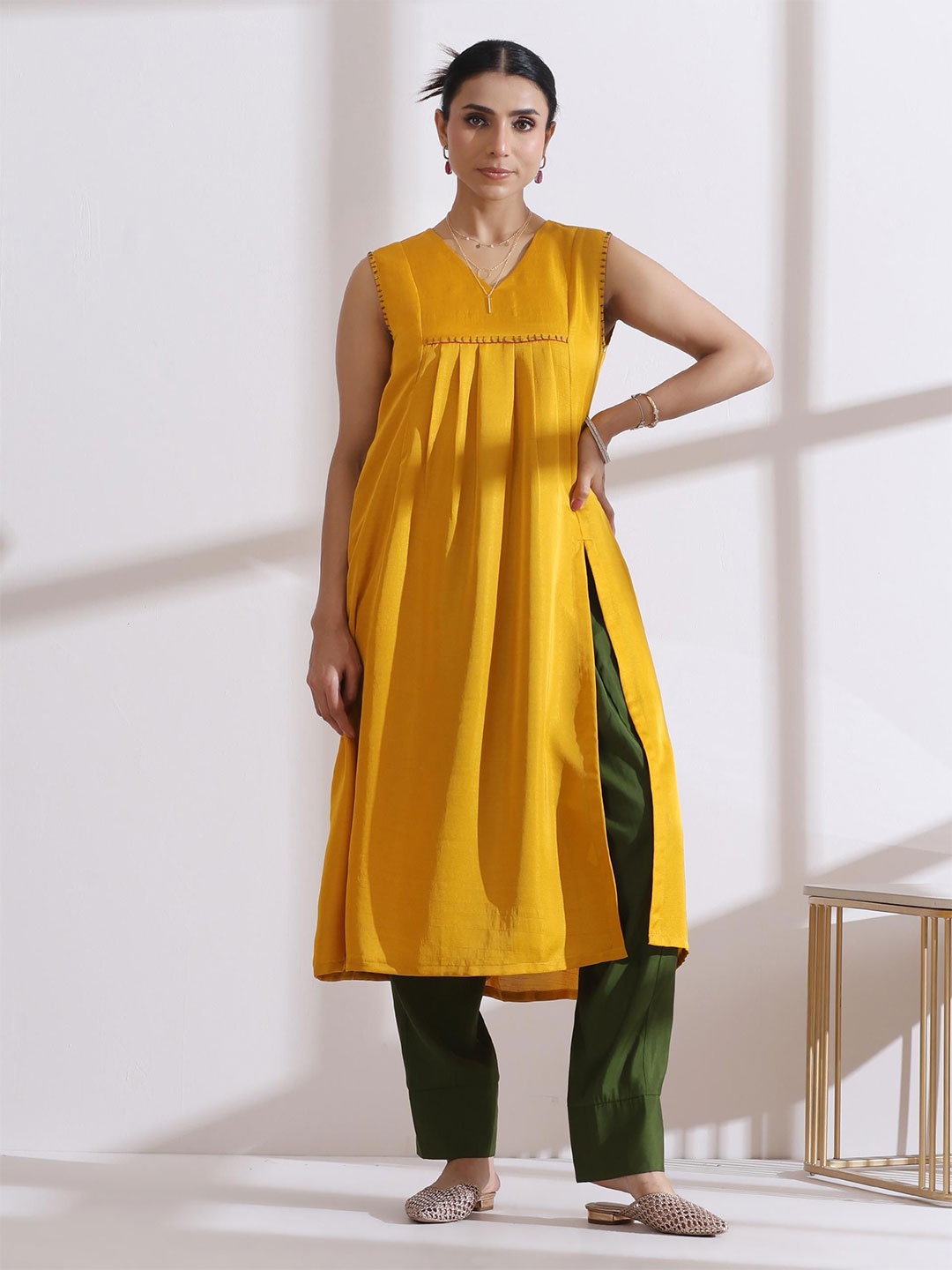 

Swtantra Women Embroidered Regular Thread Work Kurta with Trousers, Mustard