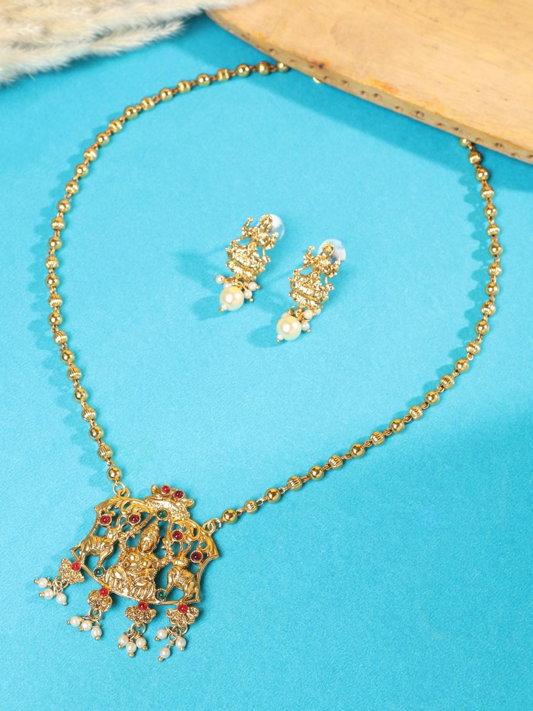 

ANIKAS CREATION Gold-Plated Stone Studded & Pearls Beaded Necklace With Earrings