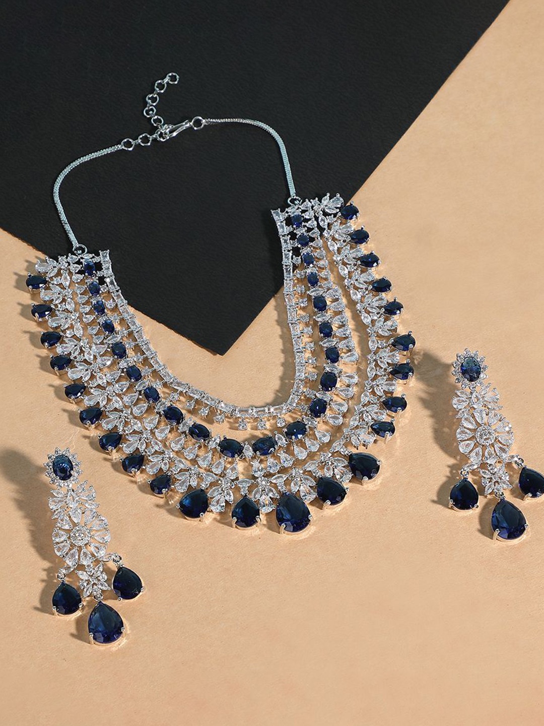 

AURAA TRENDS Silver-Plated AD Stone Studded Jewllery Set
