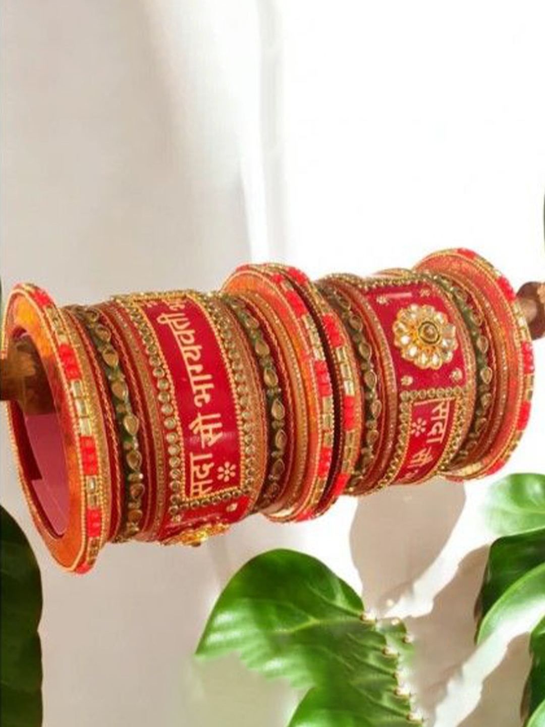 

leshya Set Of 18 Stone Studded Traditional Rajasthani Bridal Chura Bangles, Gold