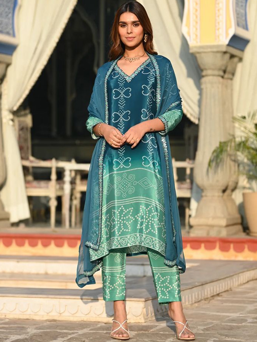 

Rujave Women Bandhani Printed Regular Mirror Work Kurta with Trousers & With Dupatta, Blue