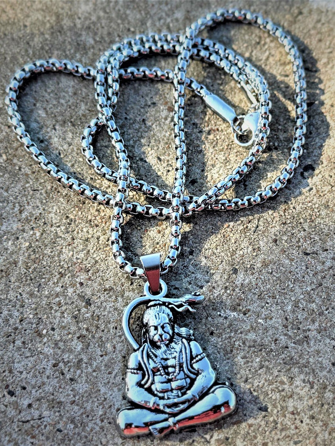 

AKLINA Silver-Plated Lord Bajrangbali Balaji Oxidised Pendants With Chains