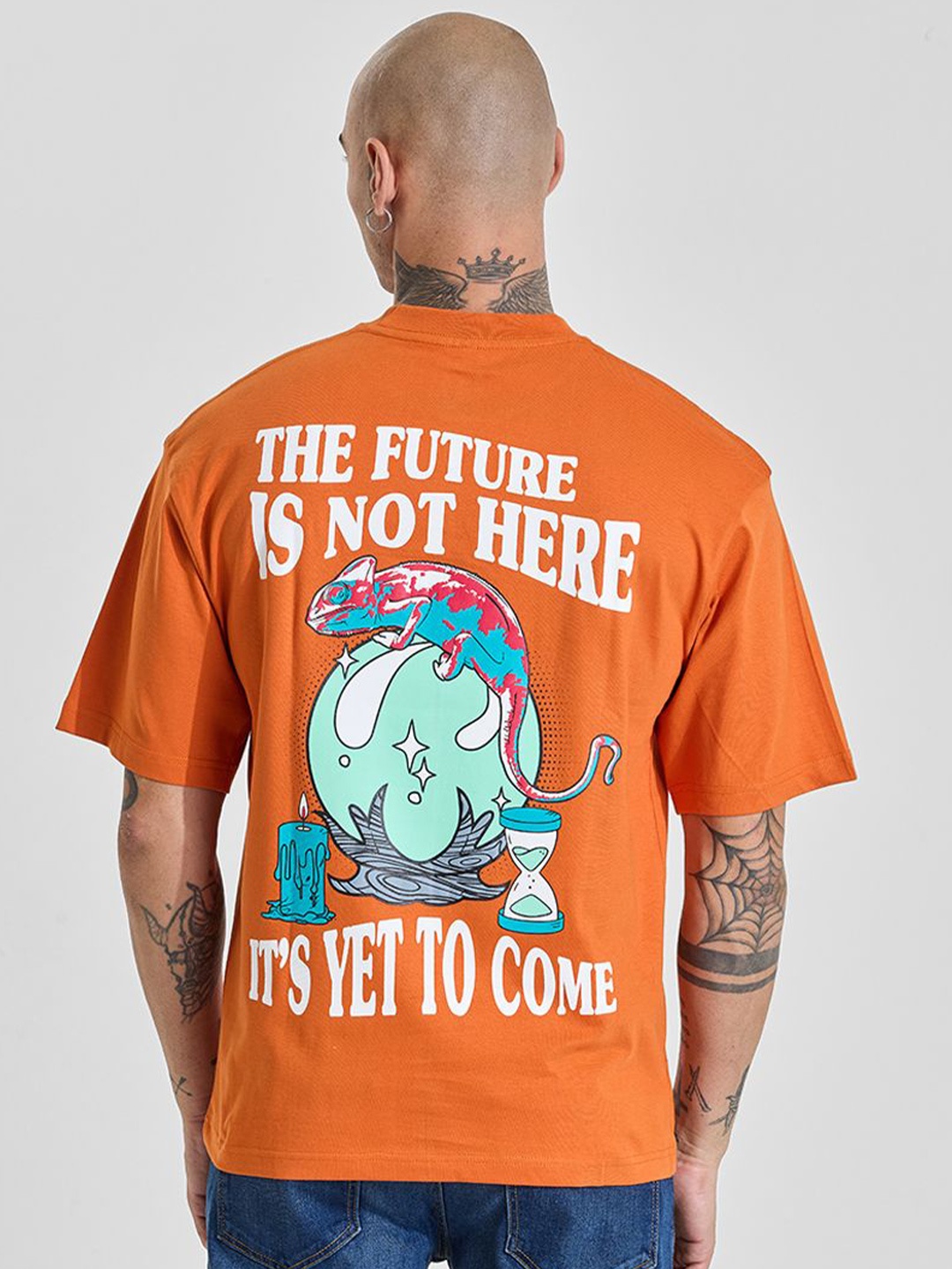 

Snitch Men Typography Printed Drop-Shoulder Sleeves Pure Cotton T-shirt, Orange