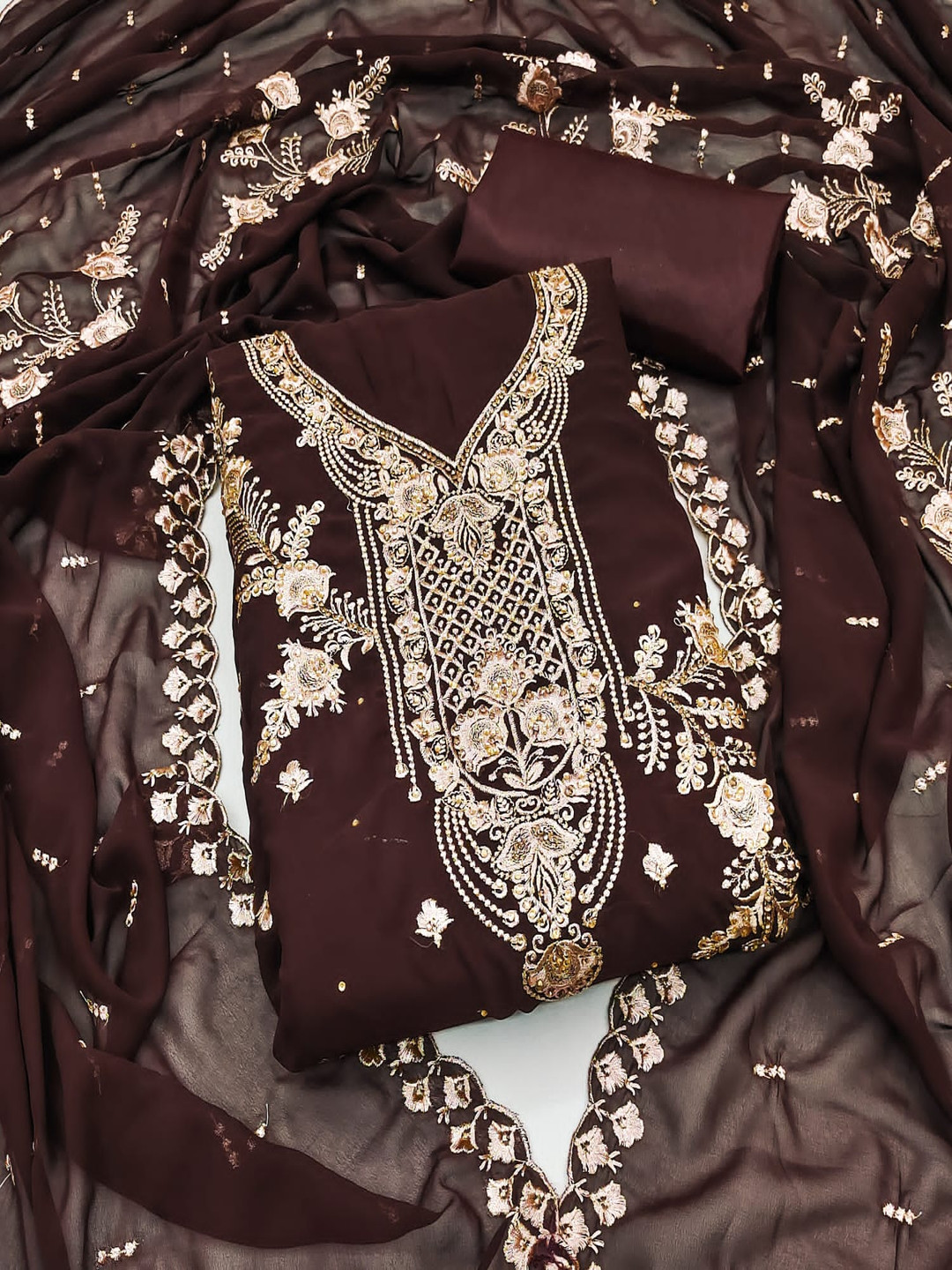 

Rangtulika Ethnics Floral Embroidered Beads And Stones Georgette Unstitched Dress Material, Brown