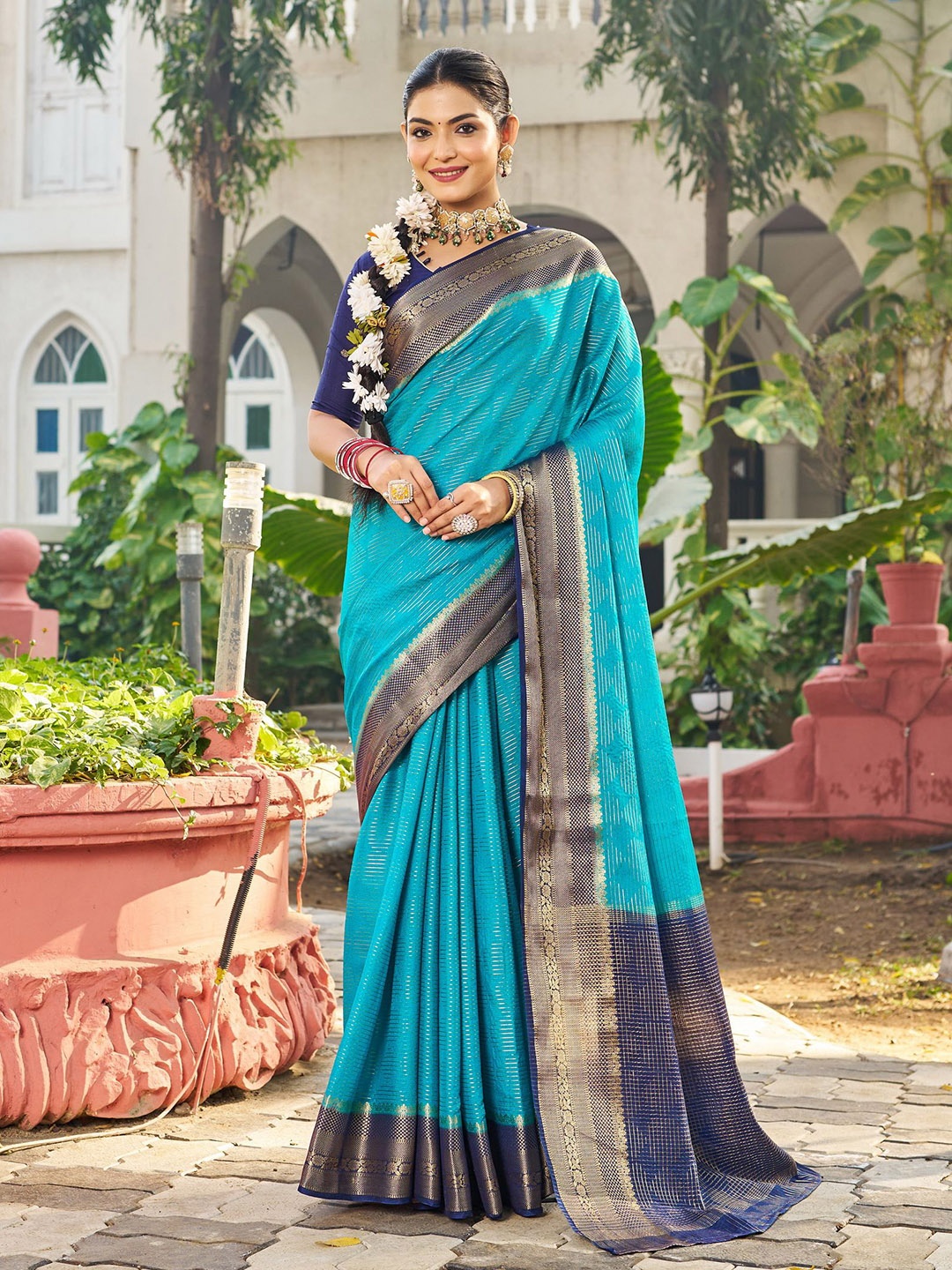 

Sanu Silk Woven Design Zari Poly Georgette Saree, Turquoise blue