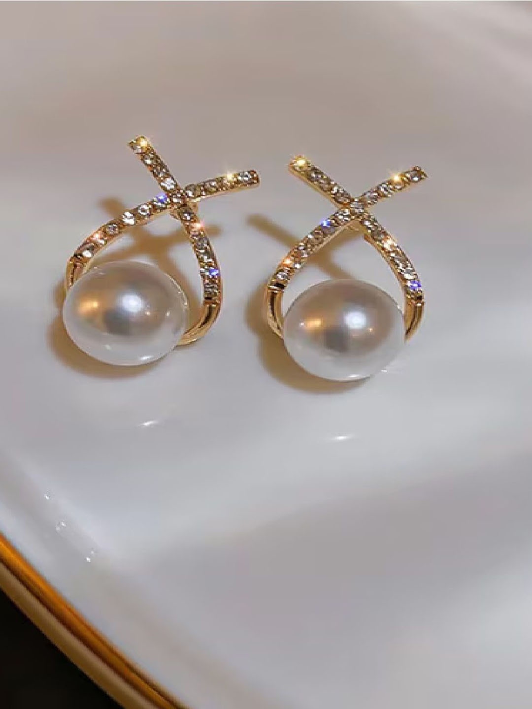 

Crazy Fashion Gold-Plated Pearls Studded Contemporary Studs