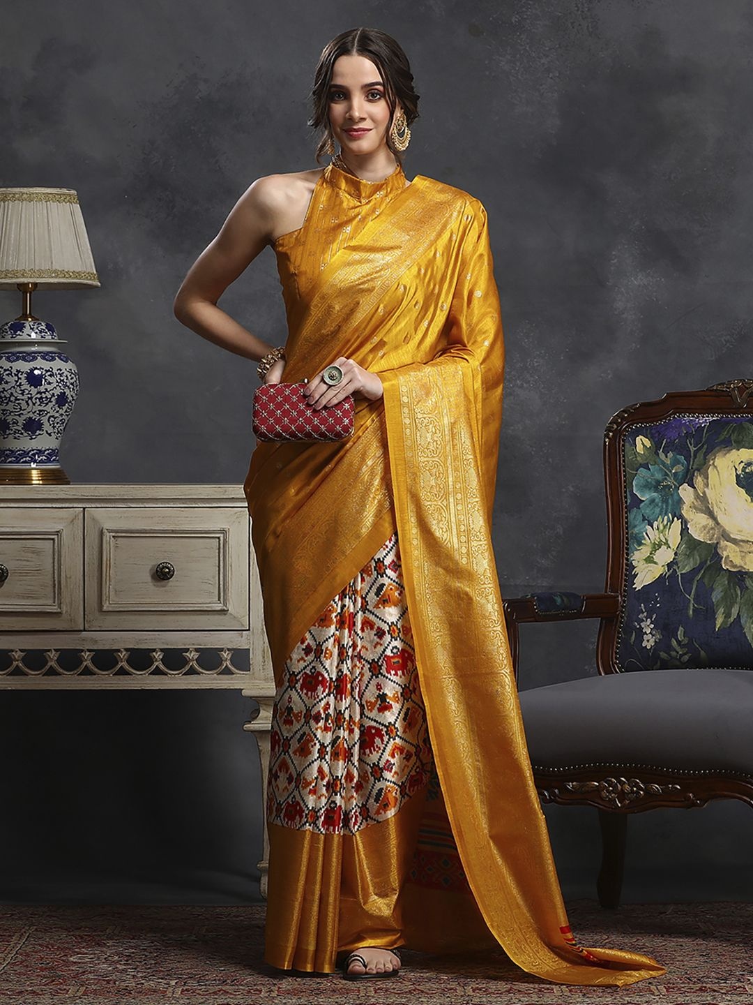 

Mitera Ethnic Motifs Zari Silk Blend Ikat Saree, Yellow