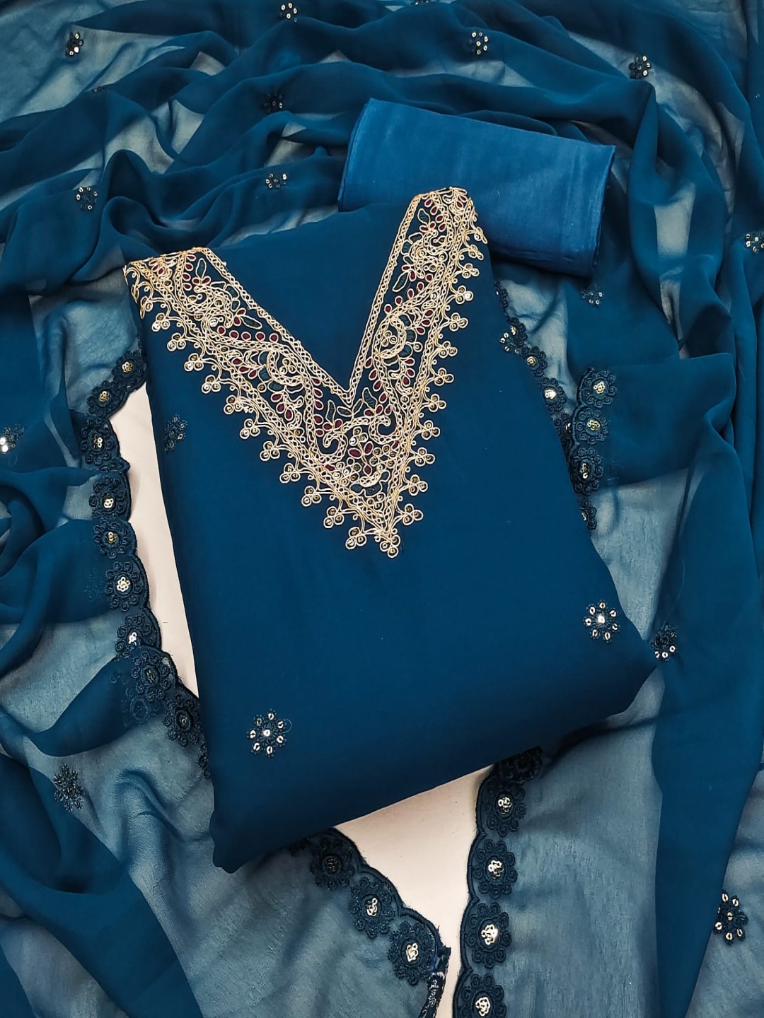

Rangtulika Ethnics Floral Embroidered Unstitched Dress Material, Blue