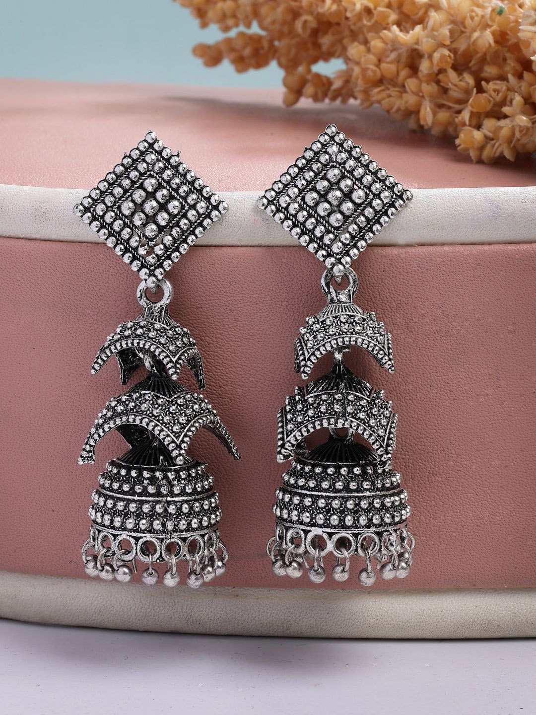 

NVR German Silver Traditional Silver Plated Dome Shaped Oxidised Jhumka Earrings