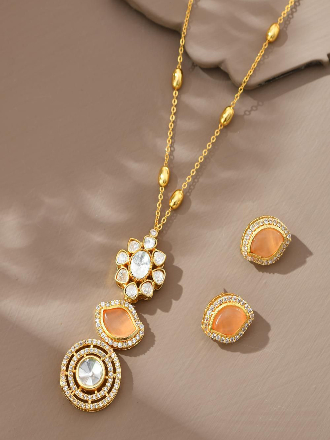 

STYYO Gold-Plated Artificial Stones Studded Jewellery Set, Peach