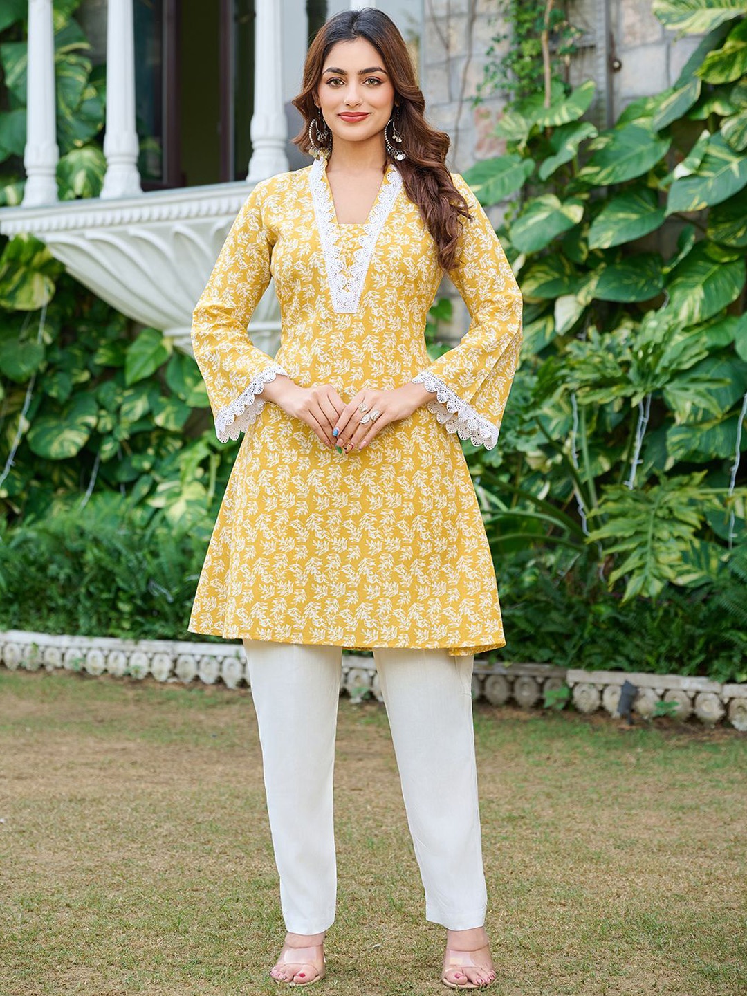 

Moda Rapido Women Floral Printed Regular Kurta with Trousers, Yellow
