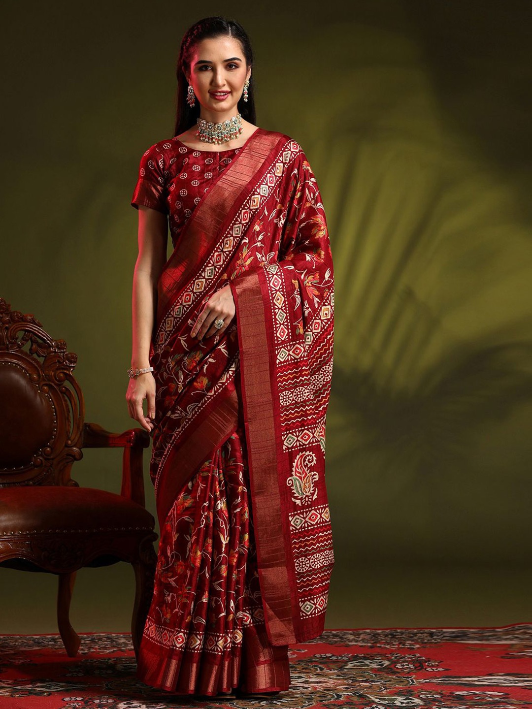 

Mitera Ethnic Motifs Zari Silk Blend Sungudi Saree, Red