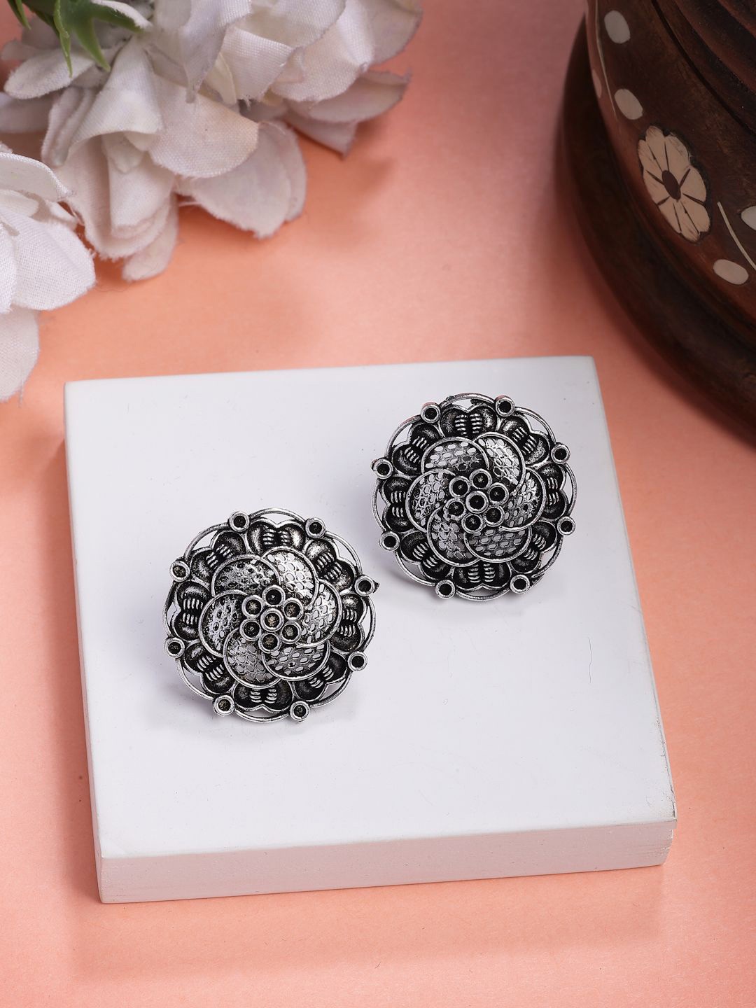

NVR Women Silver Plated Oxidised German Silver Floral Shaped Stud Earrings