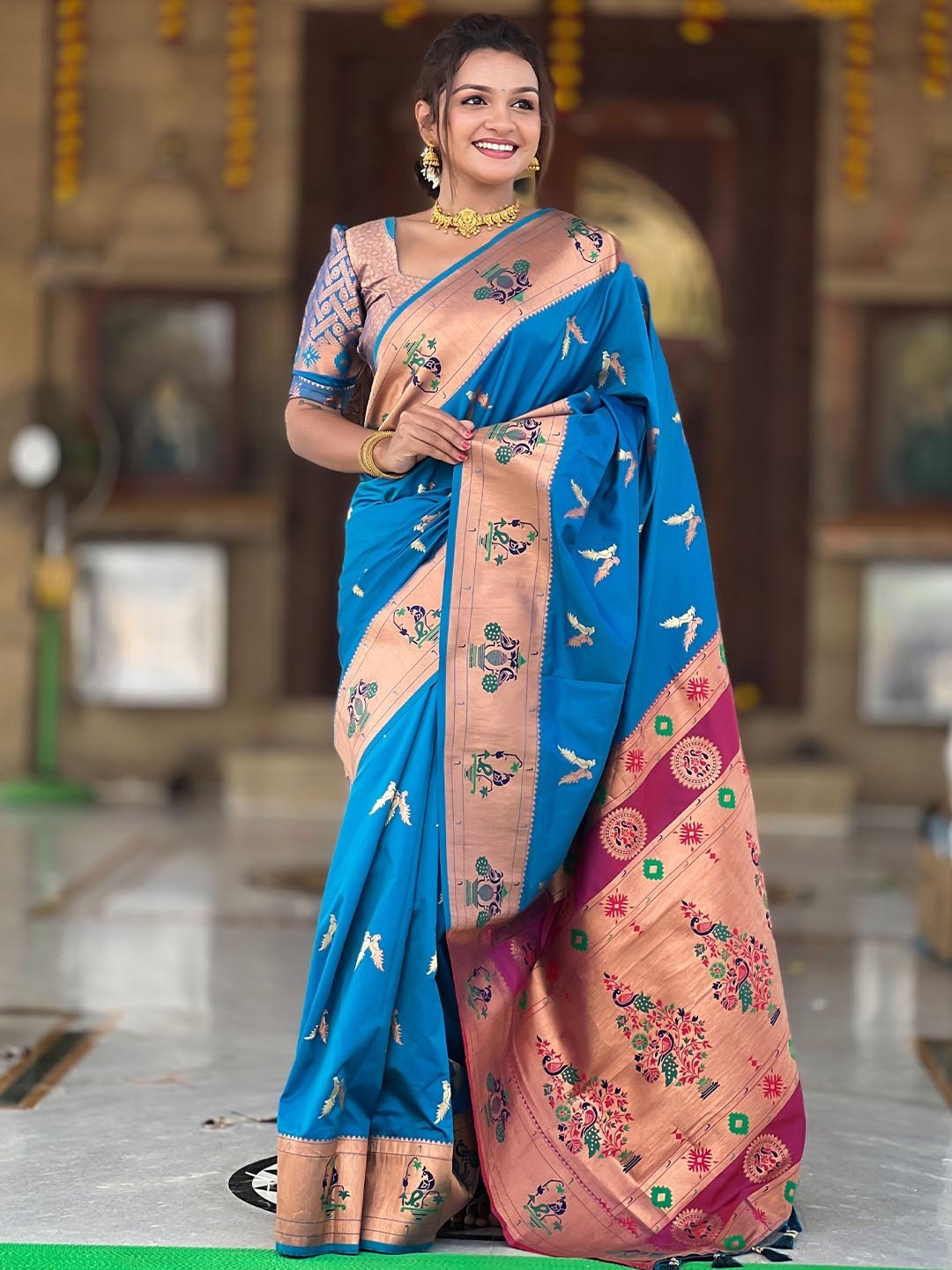 

Divyadham Textiles Woven Design Zari Pure Silk Paithani Saree, Turquoise blue