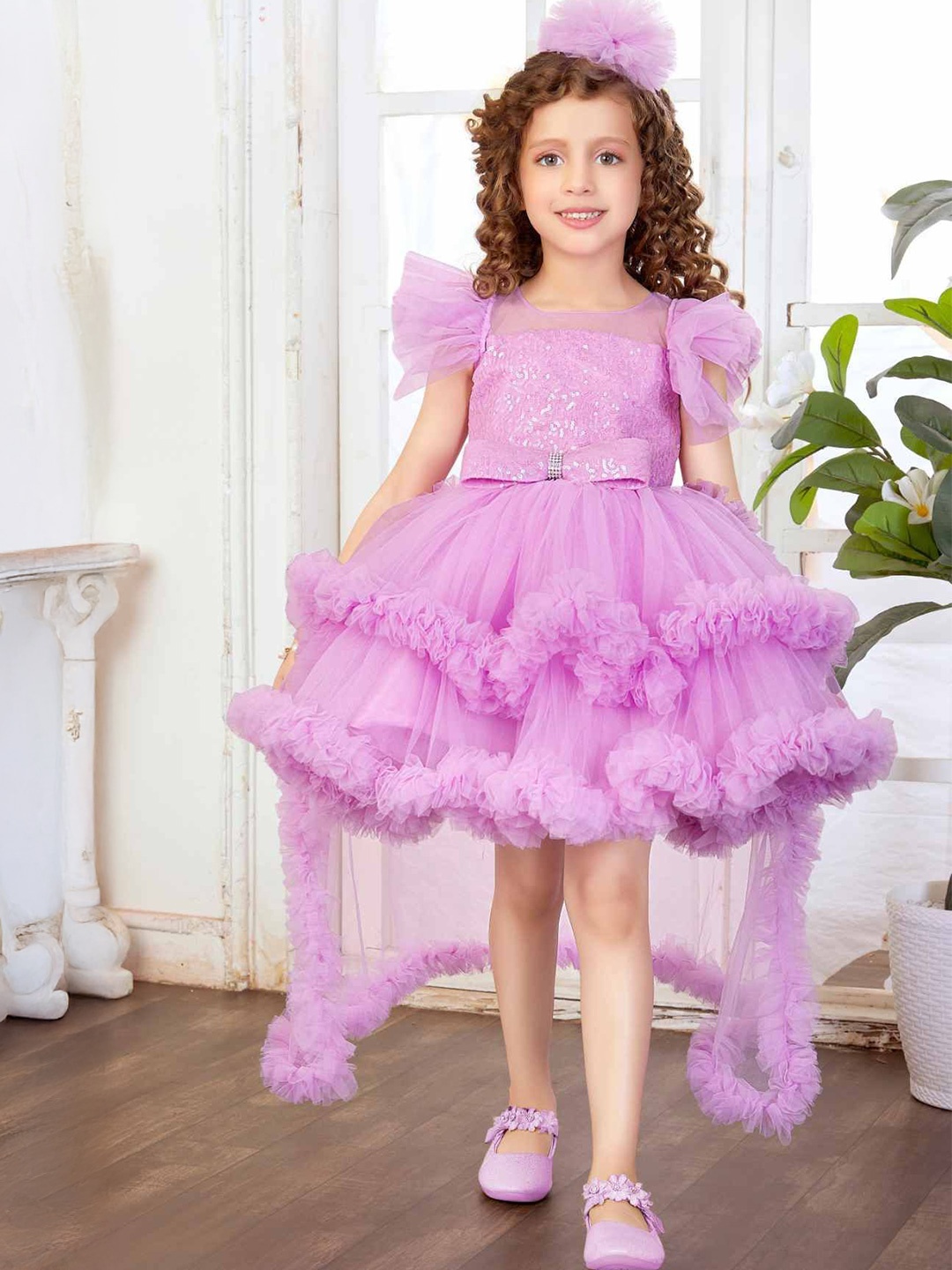 

Lagorii Girls Frill Sleeves And Bow Embellished Tailback Frock, Purple
