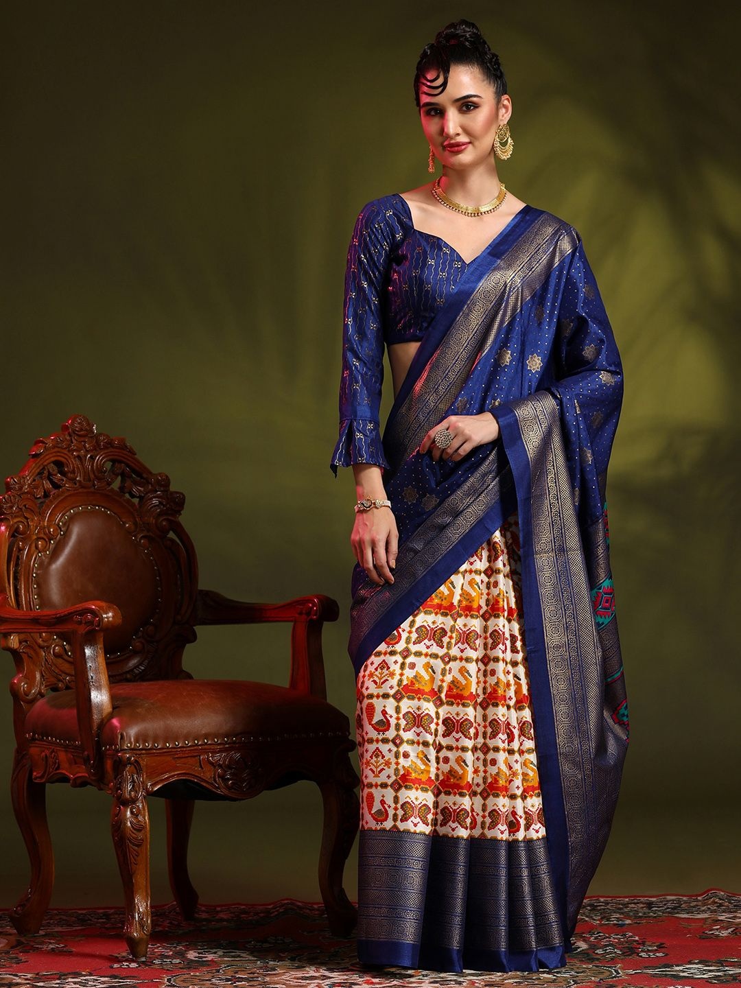 

Mitera Ethnic Motifs Zari Silk Blend Patola Saree, Blue