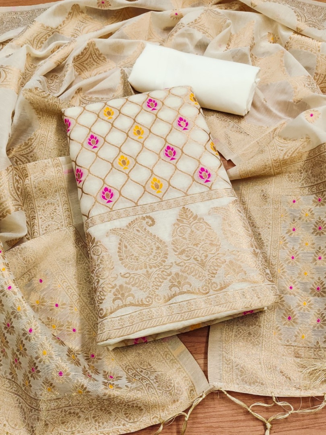 

Rangtulika Ethnics Ethnic Motifs Woven Design Banarasi Silk Unstitched Dress Material, White