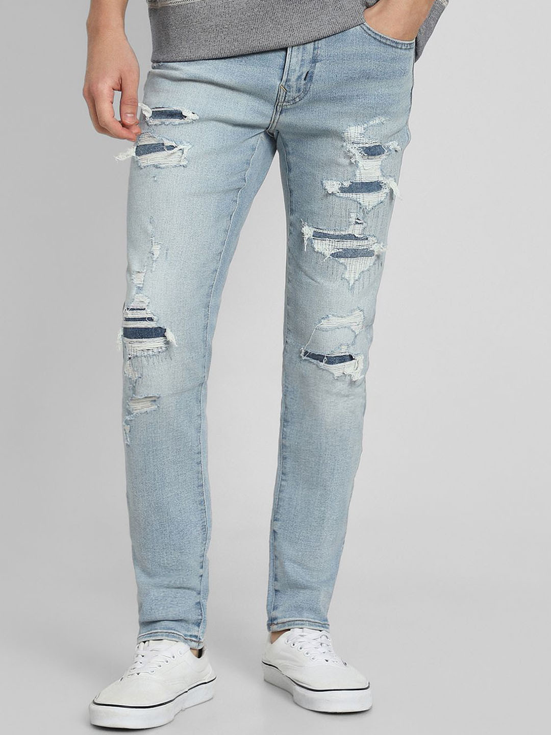 

AMERICAN EAGLE OUTFITTERS Men Highly Distressed Heavy Fade Jeans, Blue