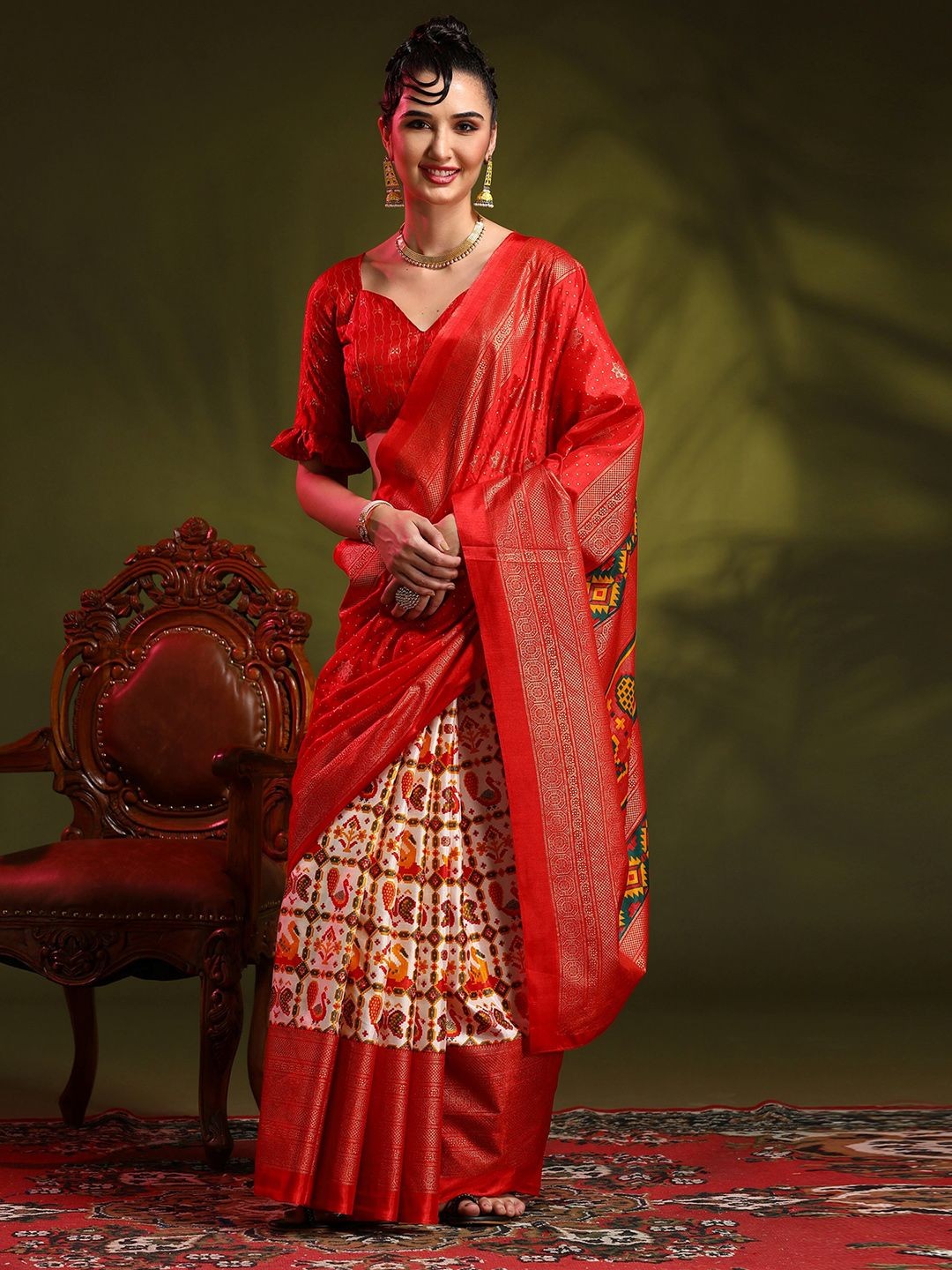 

Mitera Ethnic Motifs Zari Silk Blend Patola Saree, Red