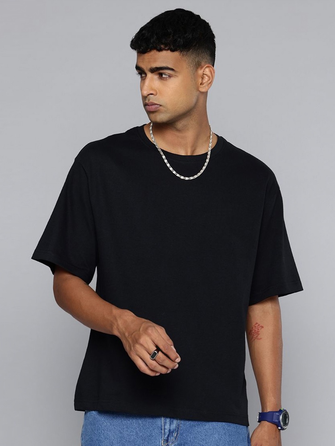 

R.Code by The Roadster Life Co. Men Printed Applique T-shirt, Black