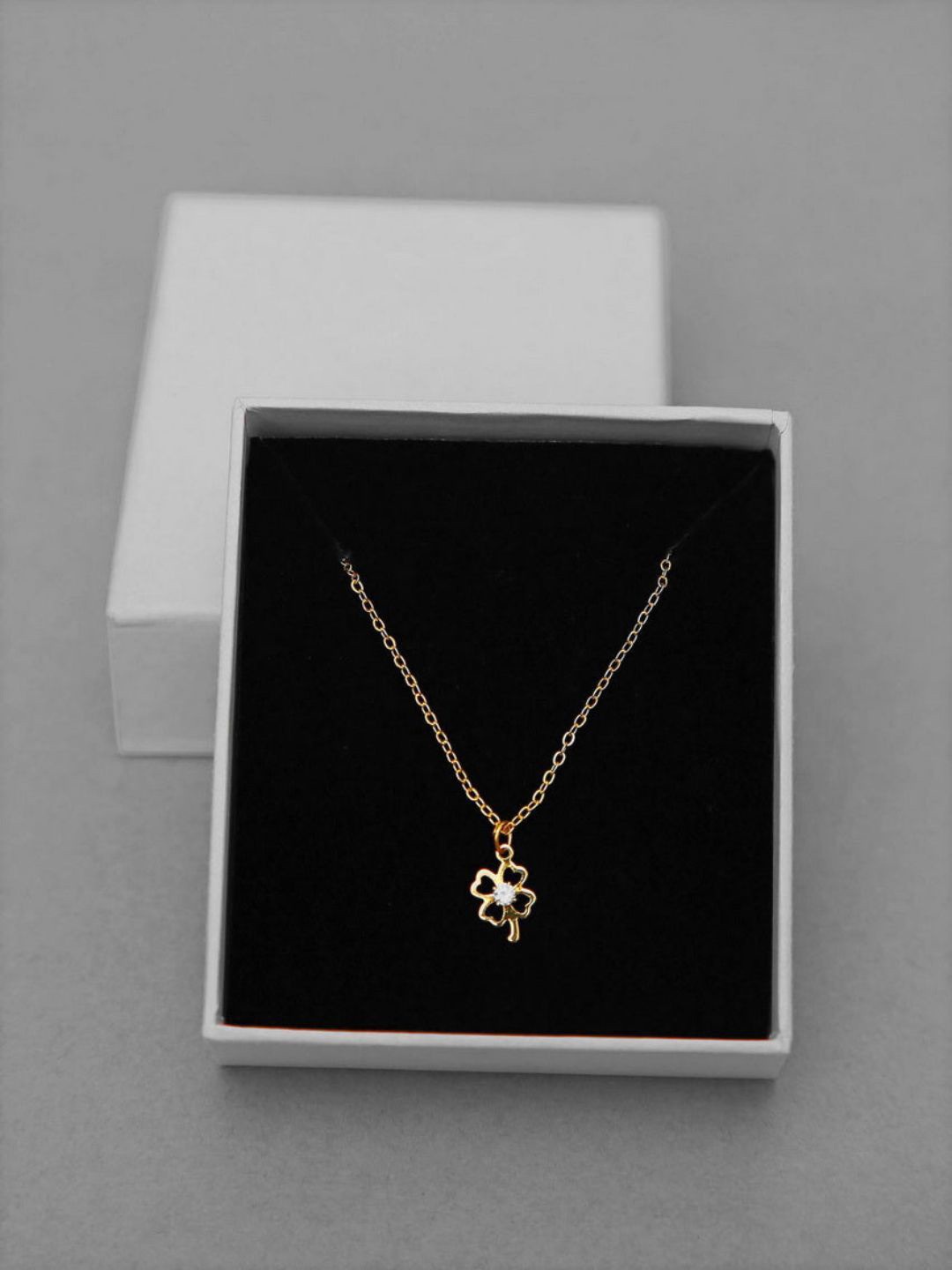 

DressBerry Gold-Plated Floral Shaped Pendant with Chains