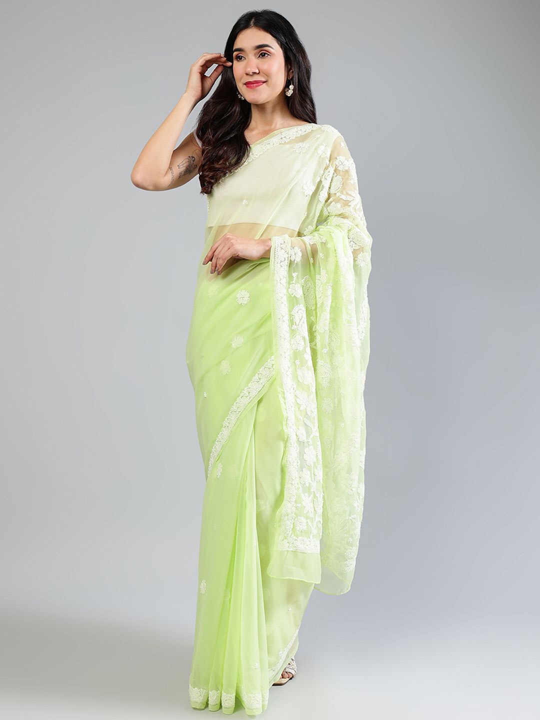 

Seva Chikan Ethnic Motifs Embroidered Poly Georgette Saree, Green